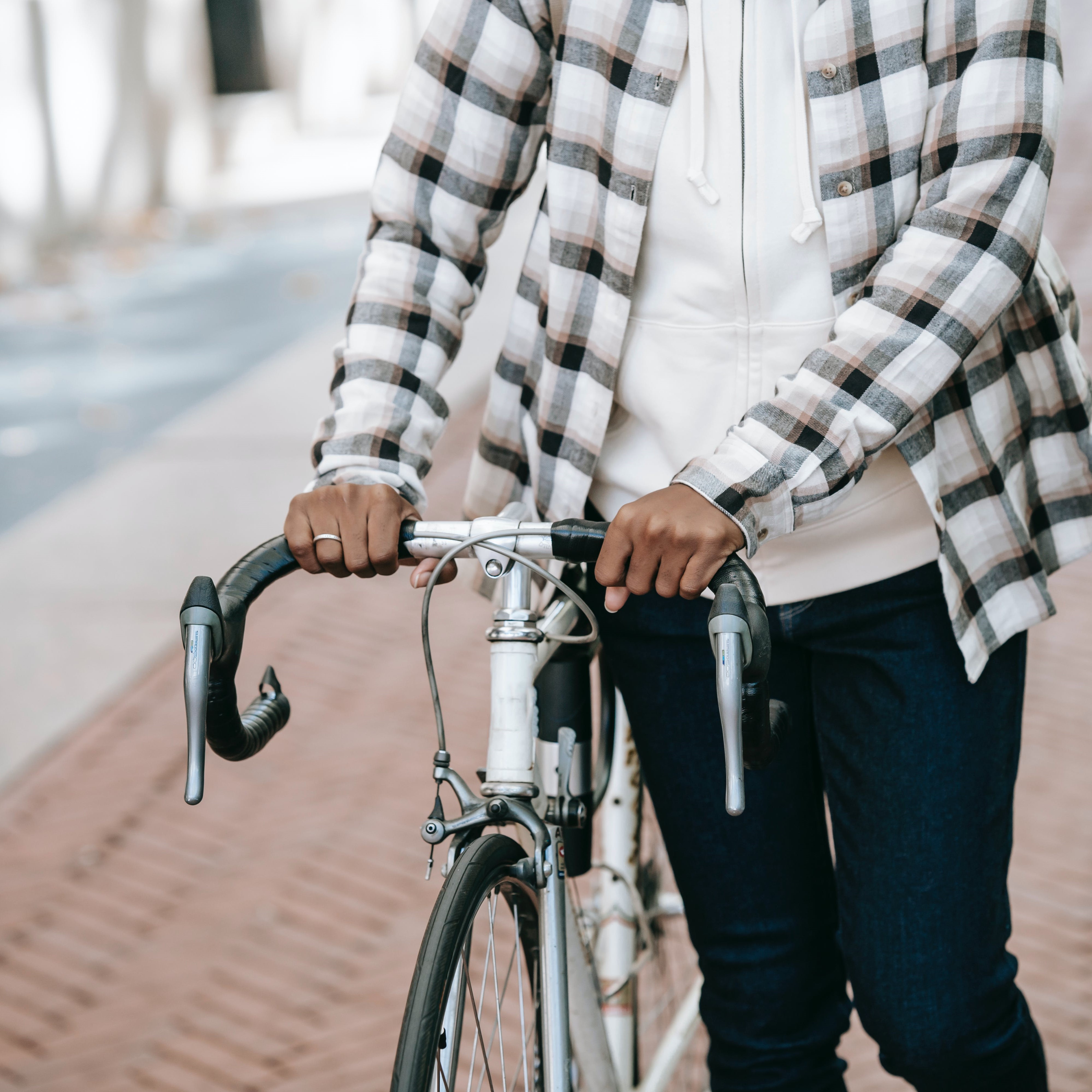 person pushing bike